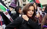 Rasmieh Odeh stands with supporters outside the federal courthouse in Detroit, November 4, 2014. (AP/Ed White)