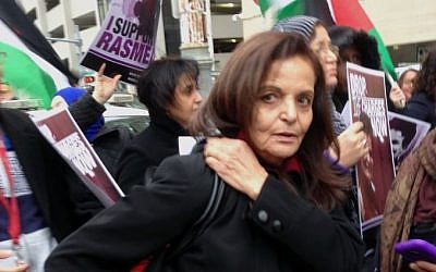 Rasmieh Odeh stands with supporters outside the federal courthouse in Detroit, November 4, 2014. (AP/Ed White)
