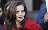 In this Monday, Nov. 10, 2014, file photo, Rasmieh Yousef Odeh, 67, of Chicago is interviewed outside federal court in Detroit, after the Palestinian immigrant was found guilty of immigration fraud for failing to disclose her conviction and imprisonment in a Jerusalem supermarket bombing that killed two people. (AP/Carlos Osorio)