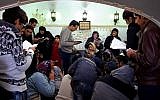 Iranian Jews pray at the tomb of Harav Oursharga, one of the holiest Jewish sites in Iran, in the city of Yazd 420 miles south of the capital Tehran, November 20, 2014. (AP Photo/Ebrahim Noroozi)