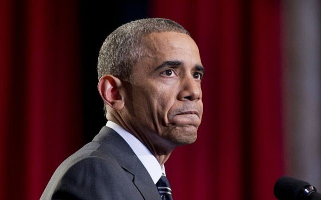 President Barack Obama pauses as he speaks about Ferguson, Missouri, before speaking at the Copernicus Community Center in Chicago to discuss immigration reform, Tuesday, November 25, 2014. (photo credit: AP/Pablo Martinez Monsivais) President Barack Obama pauses as he speaks about Ferguson, Missouri, before speaking at the Copernicus Community Center in Chicago to discuss immigration reform, Tuesday, November 25, 2014. (photo credit: AP/Pablo Martinez Monsivais)