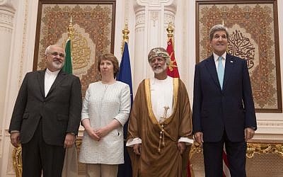 From left, Iranian Foreign Minister Javad Zarif, European Union adviser Catherine Ashton, Omani Minister Responsible for Foreign Affairs Yussef bin Alawi and US Secretary of State John Kerry, in Muscat on Sunday Nov. 9, 2014. (photo credit: AP PHOTO/NICHOLAS KAMM, POOL)