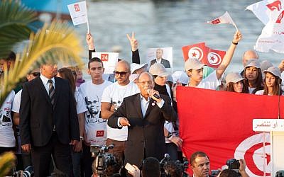 Presidential candidate and Tunisian President, Moncef Marzouki, addresses his supporters during a campaign meeting in Bizerte, northern Tunisia, Wednesday, Nov. 19, 2014 (photo credit: AP/Aimen Zine)