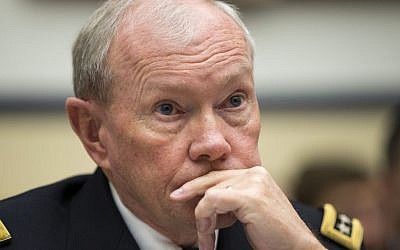 Joint Chiefs Chairman Gen. Martin Dempsey listens on Capitol Hill in Washington, Thursday, Nov. 13, 2014, while testifying before the House Armed Services committee hearing on the Islamic State group. (Photo credit: AP/Evan Vucci)
