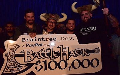 The AirHop team accepts the $100,000 prize from PayPal (Photo credit: Courtesy)