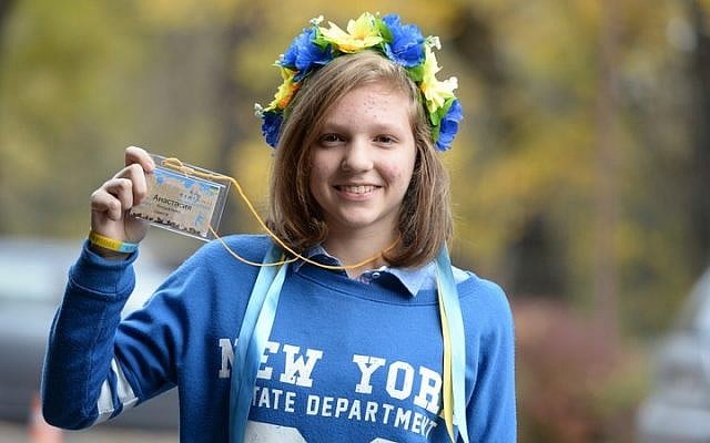 Anastasia, a young Jewish participant of Limmud FSU in Lviv, Ukraine, wears a flower head-piece known as 'vinok,' a symbol of Ukrainian culture, in Ukrainian colors. (photo credit: Yossi Aloni)