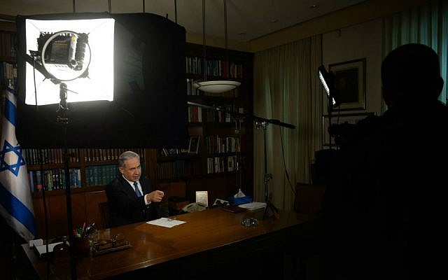 Prime Minister Netanyahu speaking to international media from his Jerusalem office, November 23, 2014 (photo credit Haim Zach/GPO)