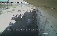 Screen capture showing the moments after a Palestinian teenager was fatally shot, allegedly by a border policeman during Nakba Day disturbances, May 15, 2014. (YouTube/Defence for Children Palestine)