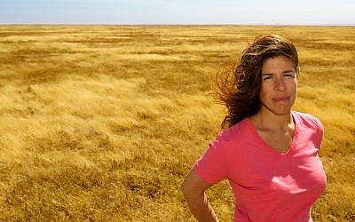 Afya founder and executive director Danielle Butin in the Serengeti. (photo credit: TJ Allan)