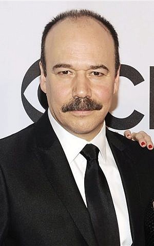 In this June 8, 2014 file photo, Danny Burstein arrives at the 68th annual Tony Awards at Radio City Music Hall in New York. (Photo credit: Charles Sykes/Invision/AP, File)