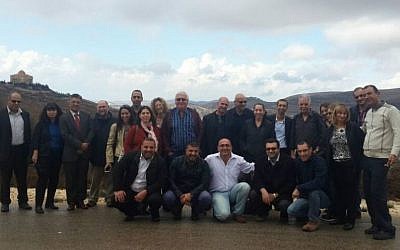 The Palestinian and Israeli Renal Society members, with Lt. Col. Dr. Adi Leiba center (photo credit: Adi Leiba/ IDF Spokesperson's Unit)