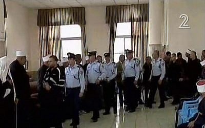 Police officials visit the family of Zidan Saif, a policeman killed in a Jerusalem terror attack, in the Druze town of Yanuh-Jat on November 19, 2014. (Screen capture: Channel 2)