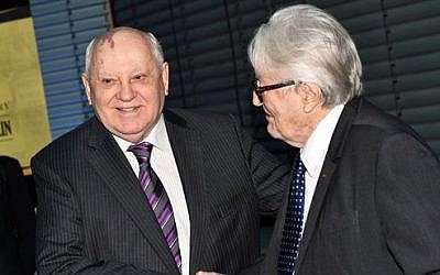 Former Soviet Leader Mikhail Gorbachev and former French Foreign Minister Roland Dumas greet each others at the 25th anniversary of the fall of the Berlin wall in 2014. (Photo credit: AP/dpa/Jens Kalaene) Former Soviet Leader Mikhail Gorbachev and former French Foreign Minister Roland Dumas greet each others at the 25th anniversary of the fall of the Berlin wall in 2014. (Photo credit: AP/dpa/Jens Kalaene)