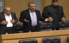 Screenshot from a Channel 10 report on November 19, 2014 on the Jordanian Parliament's moment of silence for the two Palestinian terrorists who killed five people in a terror attack on a Jerusalem synagogue on November 18, 2014.