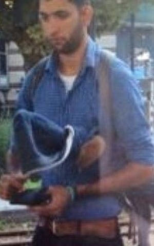 Pakistani cricket player Assimi Abbas seen in Brussels carrying his cricket bat, wrapped in a sweatshirt. The sporting equipment was mistaken for a weapon and set off a terror scare in Brussels, November 2014. (Photo credit: As circulated by Belgian Police)
