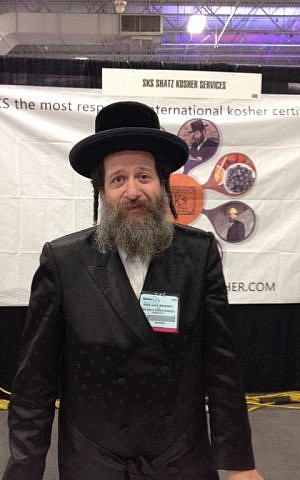 Rabbi David Moskowitz, CEO of Shatz Kosher Services (SKS) speaks Chinese to clearly communicate with his clients. (Jesse Lempel/The Times of Israel) Rabbi David Moskowitz, CEO of Shatz Kosher Services (SKS) speaks Chinese to clearly communicate with his clients. (Jesse Lempel/The Times of Israel)
