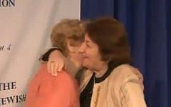Screenshot from a YouTube video of the reunion between Mira Wexler and, Helena Weglowski, organized by the Jewish Foundation for the Righteous, November 27, 2014.