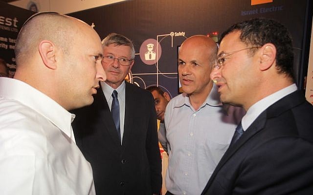 (L to R) Naftali Bennett, Minister of Economy, Yossi Shnek, IEC Chief Information Officer, Eli Glickman, CEO of the IEC, Colonel (Res.) Natan Barak, mPrest CEO, at the Homeland Security Conference in Tel Aviv Tuesday (Photo Credit: Yossi Weiss/IEC) (L to R) Naftali Bennett, Minister of Economy, Yossi Shnek, IEC Chief Information Officer, Eli Glickman, CEO of the IEC, Colonel (Res.) Natan Barak, mPrest CEO, at the Homeland Security Conference in Tel Aviv Tuesday (Photo Credit: Yossi Weiss/IEC)