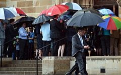 Visitors enter the Great Hall at the University of Sydney for the memorial service of Katrina Dawson in Sydney on December 23, 2014. (Peter Parks/AFP)