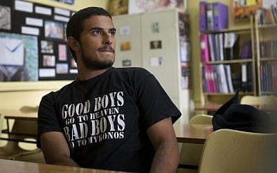 Amer, a Syrian refugee who takes weekly English classes at the American Academy in Nicosia, speaks with journalists on November 11, 2014 in the capital of the Mediterranean Island of Cyprus. (photo credit: AFP/FLORIAN CHOBLET)