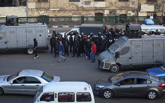 Egyptian police deploy in the Egyptian capital Cairo during a demonstration, December 5, 2014. (photo credit: AFP/MOHAMED EL-SHAHED) Egyptian police deploy in the Egyptian capital Cairo during a demonstration, December 5, 2014. (photo credit: AFP/MOHAMED EL-SHAHED)