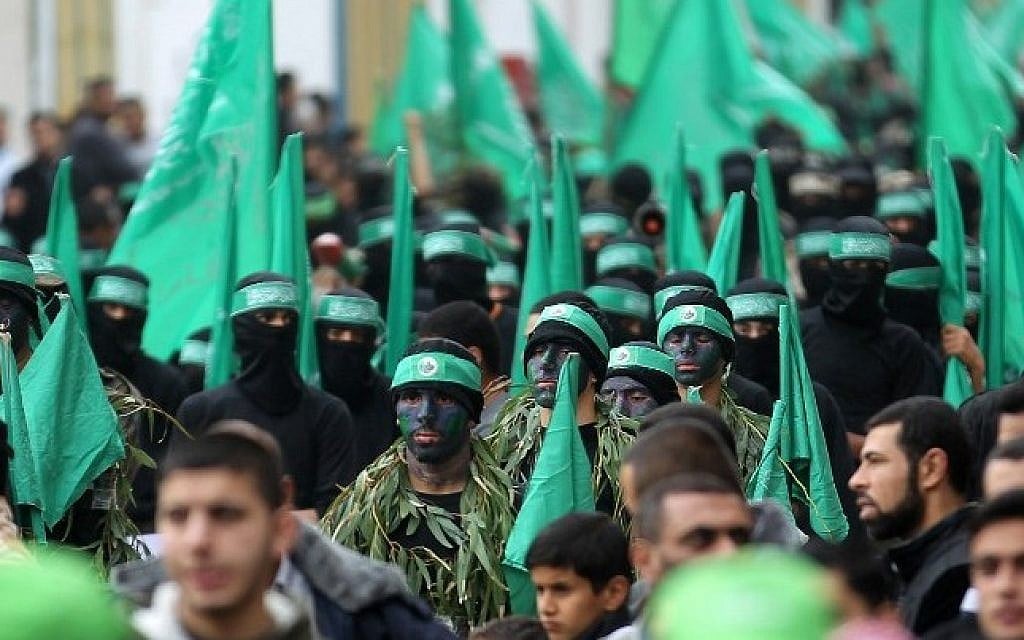 Palestinian members of the Izz ad-Din al-Qassam Brigades, the armed wing of Hamas, at a rally to commemorate the 27th anniversary of the Islamist movement’s creation, at the Nuseirat refugee camp in the Gaza Strip, on December 12, 2014. (AFP/Said Khatib) Palestinian members of the Izz ad-Din al-Qassam Brigades, the armed wing of Hamas, at a rally to commemorate the 27th anniversary of the Islamist movement’s creation, at the Nuseirat refugee camp in the Gaza Strip, on December 12, 2014. (AFP/Said Khatib)