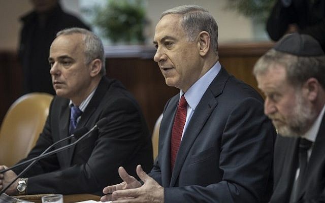 Benjamin Netanyahu chairs the weekly cabinet meeting in his Jerusalem offices on December 14, 2014. photo credit: AFP/POOL/OLIVER WEIKEN) Benjamin Netanyahu chairs the weekly cabinet meeting in his Jerusalem offices on December 14, 2014. photo credit: AFP/POOL/OLIVER WEIKEN)