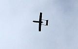 Illustrative: A drone belonging to the al-Qassam Brigades, Hamas' armed wing, flies over Gaza City on December 14, 2014. (photo credit: AFP/MAHMUD HAMS)