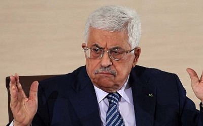 Palestinian Authority President Mahmoud Abbas speaks during a press conference at the Ministry of Foreign Affairs in Algiers, December 23, 2014. (photo credit: AFP/Farouk Batiche)
