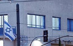 Bullets holes are seen on the Israeli embassy building in Athens on December 12, 2014. (Photo credit: AFP/ LOUISA GOULIAMAKI)