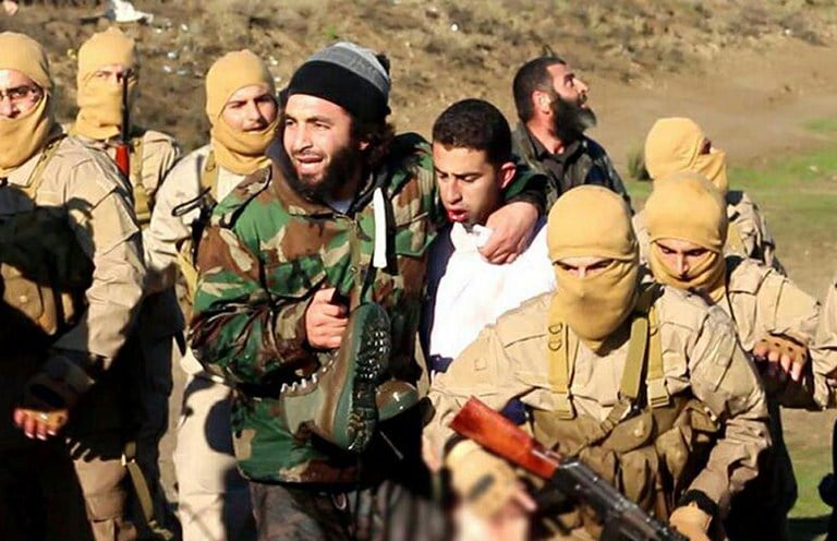 A still image released by Islamic State on jihadist websites on December 24, 2014, purportedly shows a Jordanian pilot captured by IS after they shot down a warplane from the US-led coalition near Raqqa, Syria. (photo credit: AFP/HO/Welayat Raqa) A still image released by Islamic State on jihadist websites on December 24, 2014, purportedly shows a Jordanian pilot captured by IS after they shot down a warplane from the US-led coalition near Raqqa, Syria. (photo credit: AFP/HO/Welayat Raqa)