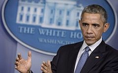 Former US president Barack Obama speaks during a press conference in the briefing room of the White House December 19, 2014, in Washington, DC. (AFP/Brendan Smialowski)