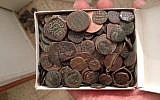 Coins confiscated from a suspected antiquities thief's home in Beit Shemesh, December 2014 (photo credit: Unit for the Prevention of Antiquities Robbery of the Israel Antiquities Authority)