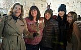 Sarah Silverman (second from right) joins Women of the Wall's Anat Hoffman, sisters Susan Silverman and Laura Silverman, and niece Ashira Abramowitz for Hanukkah candle lighting at the Western Wall, December 18, 2014. ( Daniel Shitrit)
