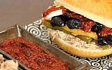 The Tunisian version of fricassee, stuffing a fried roll with flaky tuna, hard-boiled eggs, preserved lemons and spicy harissa (photo credit: Andrea Brownstein/Photoli Photography)