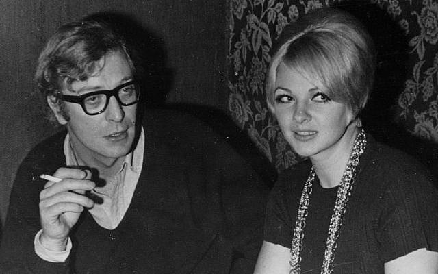British actor Michael Caine is shown with Mandy Rice-Davies at the discotheque she ran in Tel Aviv, Nov. 1968. (photo credit: AP Photo) British actor Michael Caine is shown with Mandy Rice-Davies at the discotheque she ran in Tel Aviv, Nov. 1968. (photo credit: AP Photo)