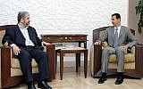 File - In this picture released by the Syrian national news agency SANA, Syrian President Bashar Assad, right, meets then-Hamas political chief Khaled Mashaal in Damascus, July 3, 2008 (AP)