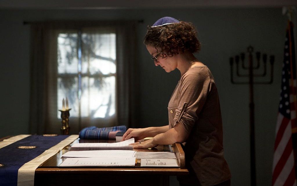 Student rabbi Sara Eiser, visiting from rabbinical school in Cincinnati, Ohio, goes over her notes before a Shabbat service at the Synagogue of the Black Hills in Rapid City, S.D. South Dakota’s first Jewish congregation was established in Deadwood more than 150 years ago during the Gold Rush. Today, fewer than 400 people make up the Jewish community in this sparsely populated state of about 845,000 residents. (photo credit: AP Photo/Kristina Barker) Student rabbi Sara Eiser, visiting from rabbinical school in Cincinnati, Ohio, goes over her notes before a Shabbat service at the Synagogue of the Black Hills in Rapid City, S.D. South Dakota’s first Jewish congregation was established in Deadwood more than 150 years ago during the Gold Rush. Today, fewer than 400 people make up the Jewish community in this sparsely populated state of about 845,000 residents. (photo credit: AP Photo/Kristina Barker)