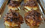 Brisket-topped latkes: not your ordinary meat and potatoes. (Shannon Sarna/JTA)