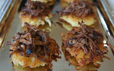 Brisket-topped latkes: not your ordinary meat and potatoes. (Shannon Sarna/JTA)