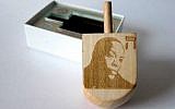 The Dr. Dreidel, a laser-etched wooden dreidel that brings together Hanukkah's traditions with modern times (Courtesy Hannah Rothstein)