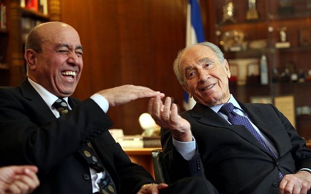 Then-president Shimon Peres (right) sits in his office with Zouheir Bahloul, January 2, 2008 (photo credit: Yossi Zamir/Flash 90)