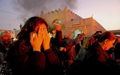 Worshipers pray at the tomb of Rabbi Israel Abuhatzeira, known as the Baba Sali, in Netivot, January 22, 2007. (Almog Sugavker/Flash90)
