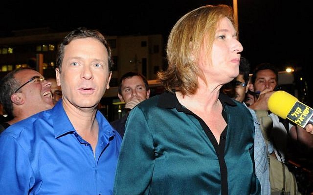 Tzipi Livni and Isaac Herzog at an anti-government demonstration in May 2012 in Tel Aviv. (photo credit: Yossi Zeliger/Flash90) Tzipi Livni and Isaac Herzog at an anti-government demonstration in May 2012 in Tel Aviv. (photo credit: Yossi Zeliger/Flash90)