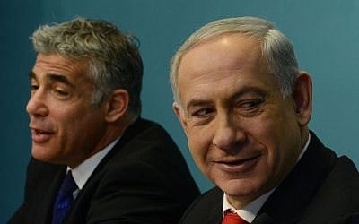 Prime Minister Benjamin Netanyahu and Finance Minister Yair Lapid, July, 2013 (photo credit: Kobi Gideon/GPO/Flash90)