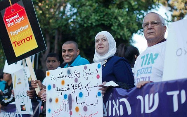 Muslims, Jews and Christians demonstrate against hatred and terrorism outside the Prime Minister's Office in Jerusalem, May 11, 2014. (Photo by Yonatan Sindel/Flash90)