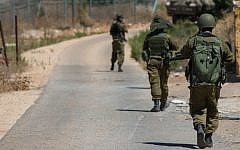Israeli soldiers patrol along the northern Israeli border with Lebanon on July 18, 2014 (photo credit: Ayal Margolin/FLASH90)