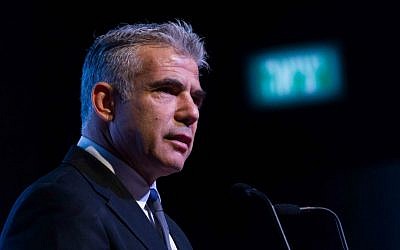 Yesh Atid party leader Yair Lapid speaks at the Jerusalem Post Diplomatic Conference, held at the David Citadel Hotel in Jerusalem. December 11, 2014. (Miriam Alster /Flash90)