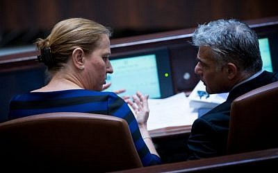 Justice Minister Tzipi Livni and Finance Minister Yair Lapid during a plenum session on the “Jewish state” bill, on November 26, 2014. (Photo credit: Miriam Alster/Flash90) Justice Minister Tzipi Livni and Finance Minister Yair Lapid during a plenum session on the “Jewish state” bill, on November 26, 2014. (Photo credit: Miriam Alster/Flash90)