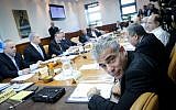 Yair Lapid at the weekly cabinet meeting in Jerusalem, November 30, 2014. (Alex Kolomoisky/Pool/Flash90)